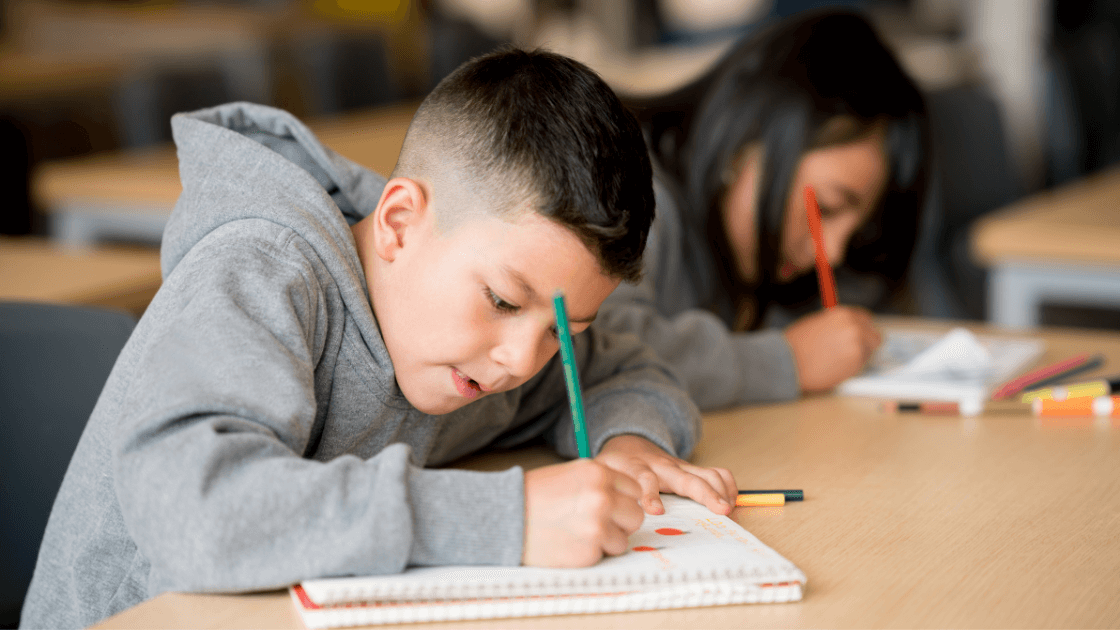 Children focused on schoolwork during a challenging time like divorce