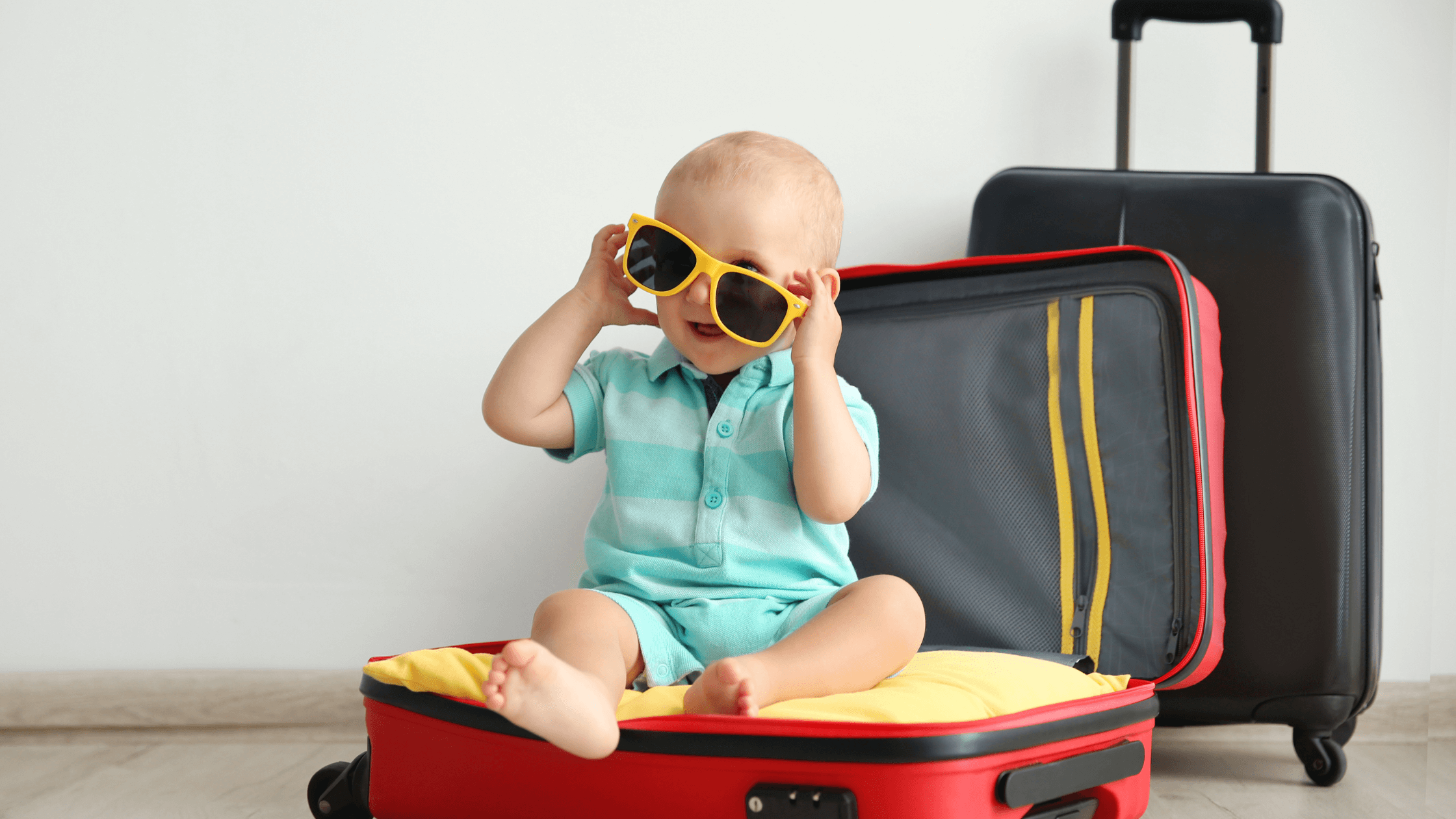 Child in sunglasses in a suitcase, representing child custody summer break texas and summer travel considerations under texas child custody summer and summer visitation texas rules.