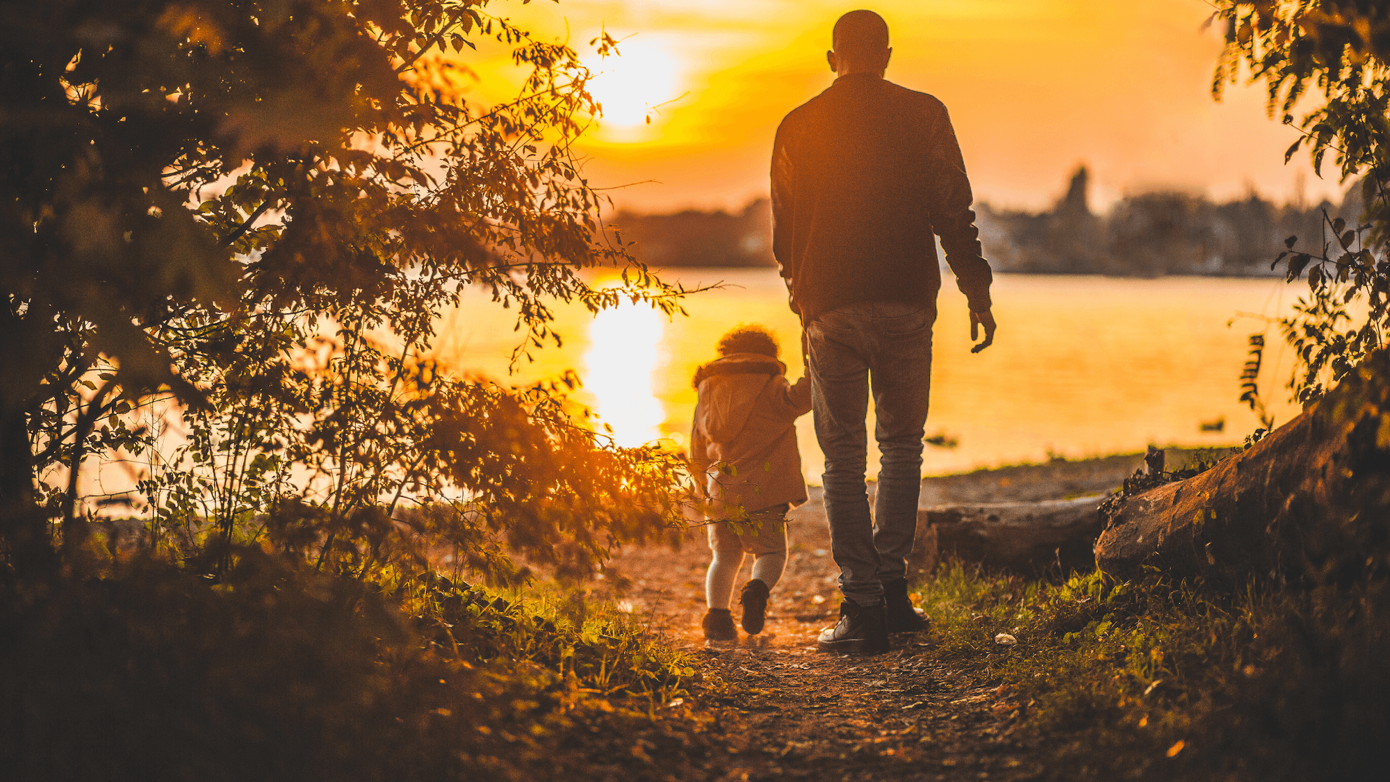 A family is visible inside the head of a large gavel. This image symbolizes how new Texas family laws in 2025 can influence custody and mediation during a divorce or other legal matter, highlighting the role of a family law attorney.