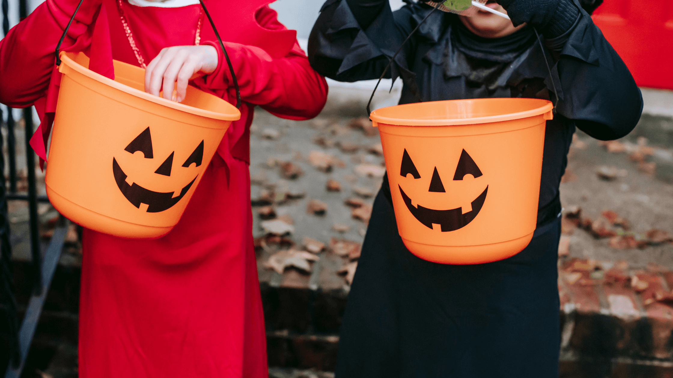 Children in costume for Halloween. This image represents divorced parents working together to make Halloween a fun and memorable experience for their children.